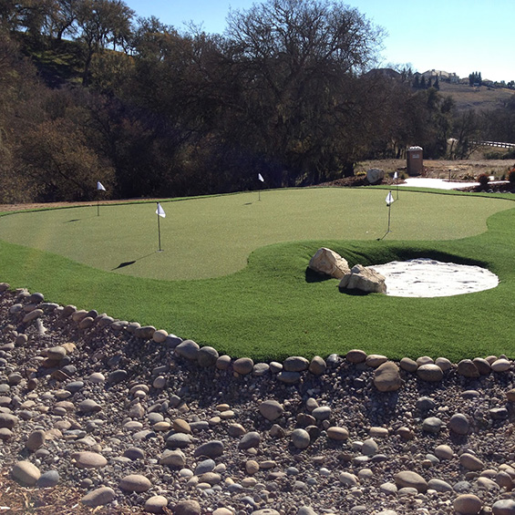 residential putting green with sandtrap