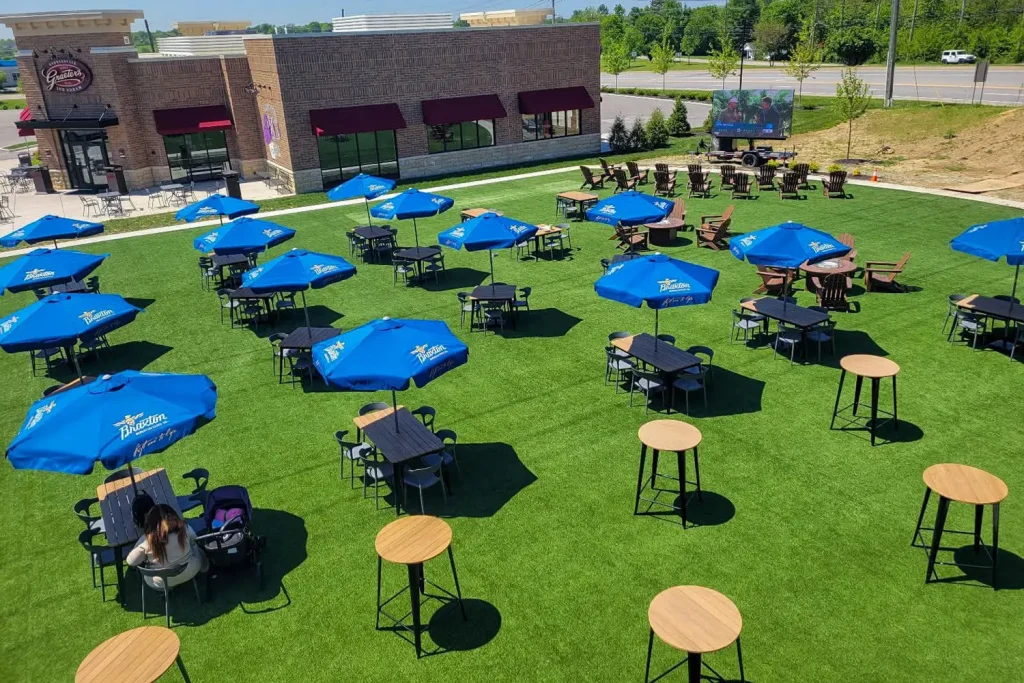 Artificial grass dining area installed by SYNLawn