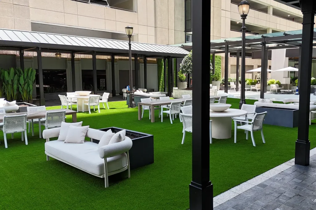 Artificial grass dining area installed by SYNLawn