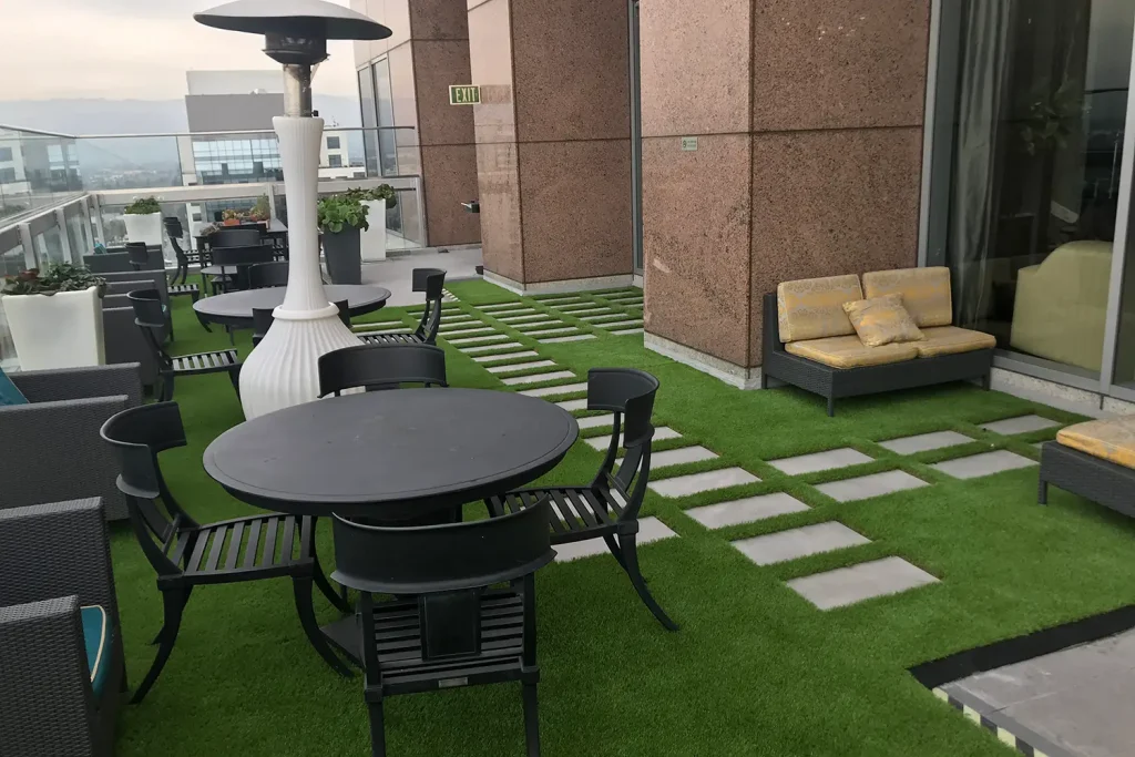 Artificial grass dining area installed by SYNLawn